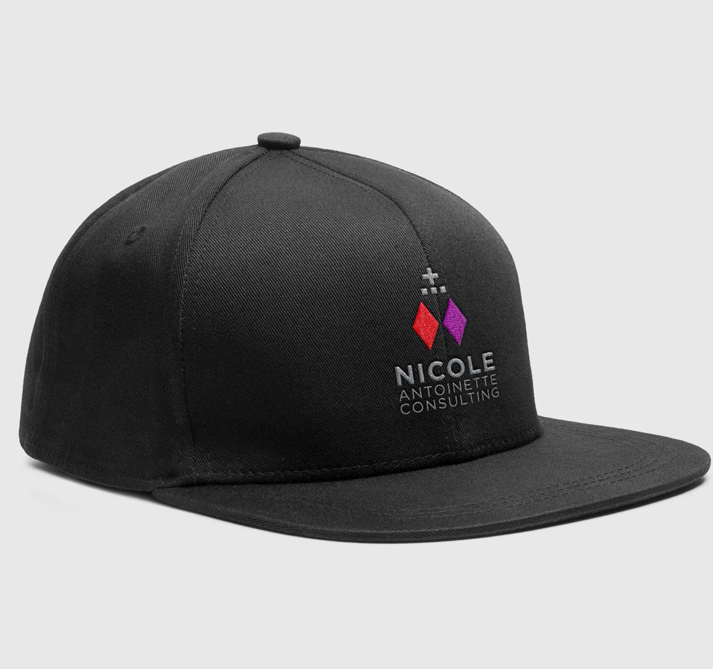 Nicole Antoinette Consulting branded cap merchandise